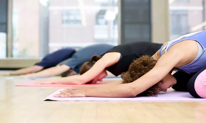 One or Two Months of Unlimited Yoga and Pilates Classes at I Am Yoga (Up to 82% Off) - Primary Image