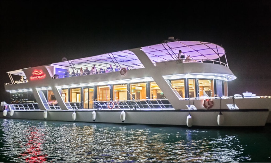 Image 1: Experience a Scenic Sunset Cruise With Buffet for One, Two or Four