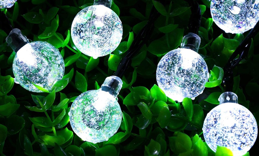 Image 12: One or Two Sets of 50-LED Solar Garden String Lights