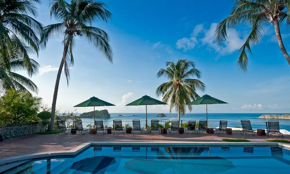 Costa Rica Volcano and Rainforest Beach Trip w/Air and Car. Based on Two Guests per Room. Buy One Voucher per Person. - Primary Image
