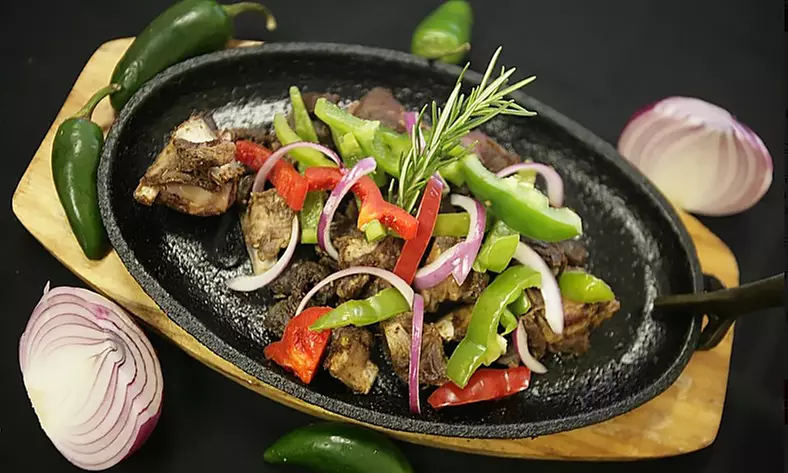$7 Toward Ethiopian Food and Drink for Takeout and Dine-In at Taste of Ethiopia - Primary Image