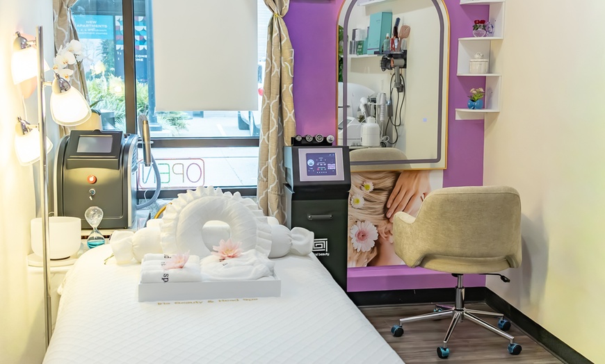 Image 3:  60 or 90-Minute Aromatherapy Massage & Hot Stone Relaxation Therapy 