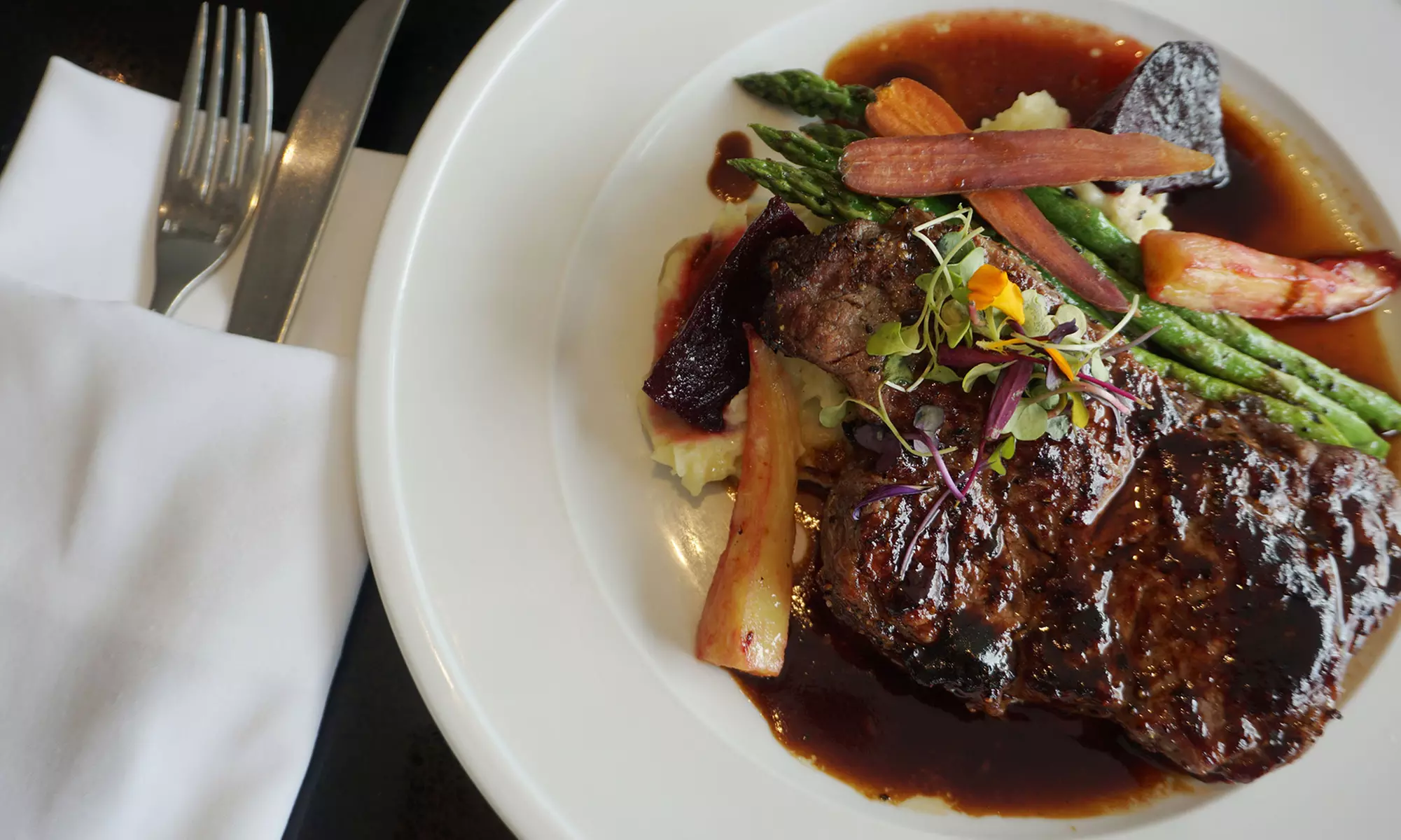 C$74 for a Three-Course Dinner for Two People at The Lobby Restaurant at Pinnacle Hotel (Up to 39% Off) - Primary Image