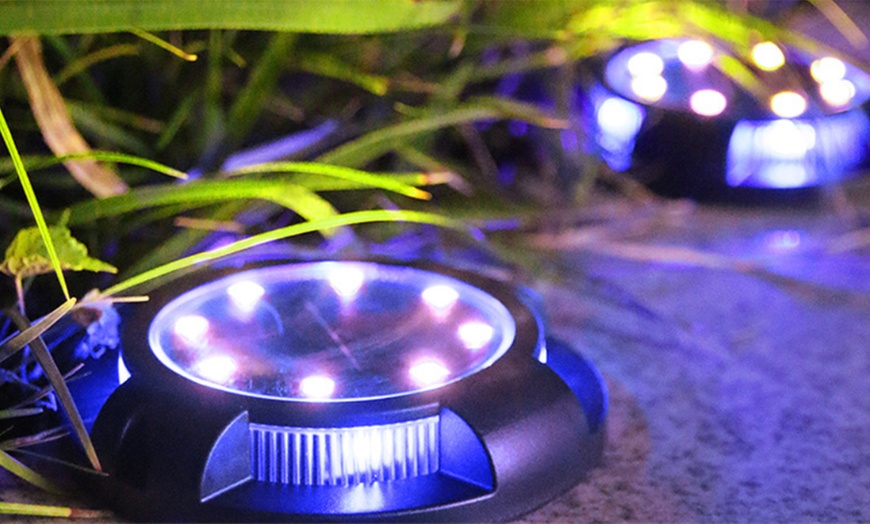 Image 1: Two or Four 12-LED Outdoor Garden Solar Underground Lights