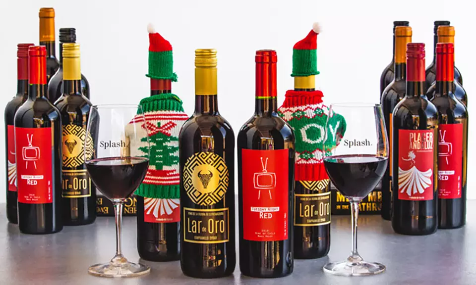 15 Bottles of Curated Wine with Ugly Holiday Sweaters and Santa Hat Toppers from Splash Wines Up to 77% Off - Primary Image