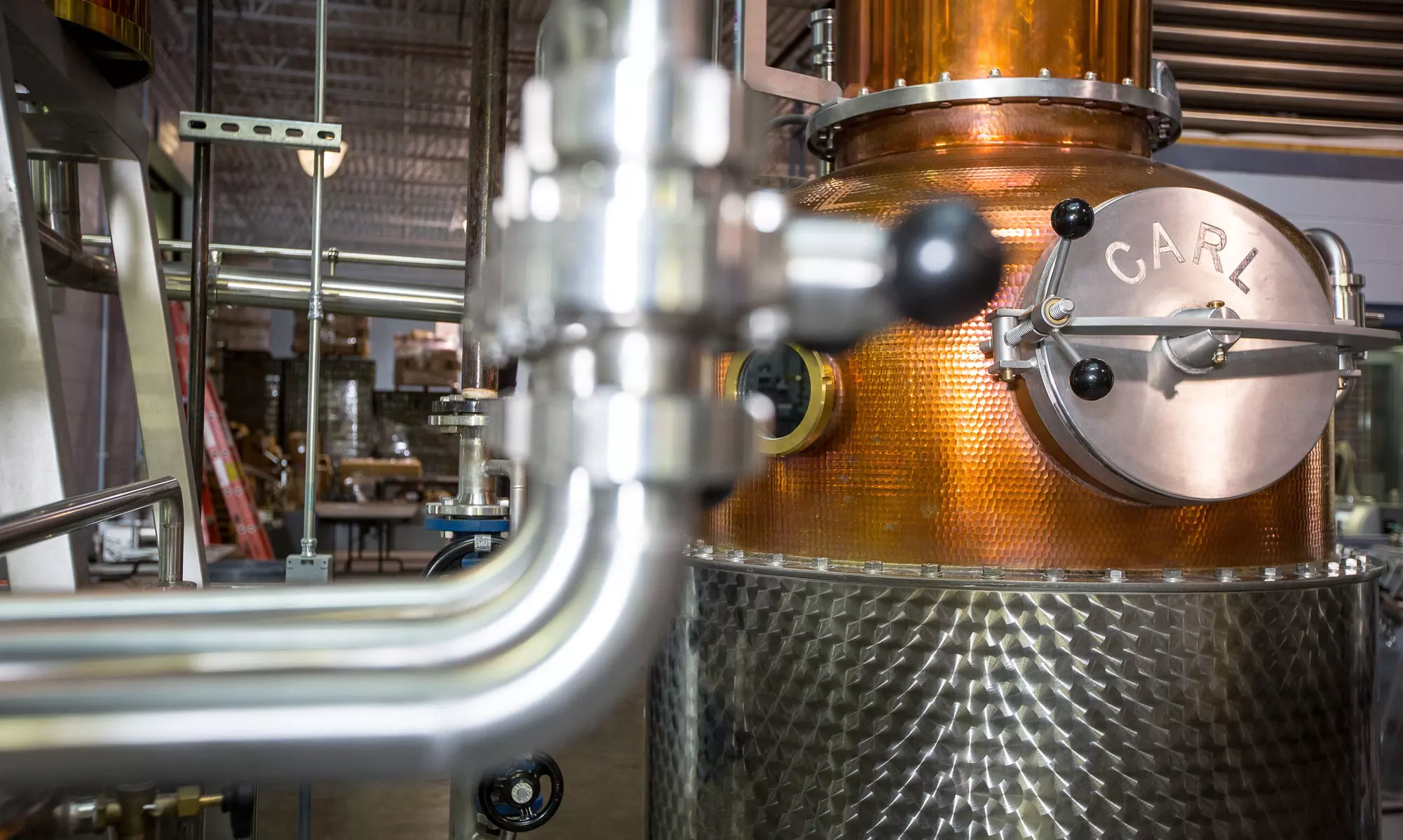 Distillery Tour, Tasting, and Souvenir Glassware for Two or Four at Top of the Hill Distillery (Up to 56% Off) - Primary Image