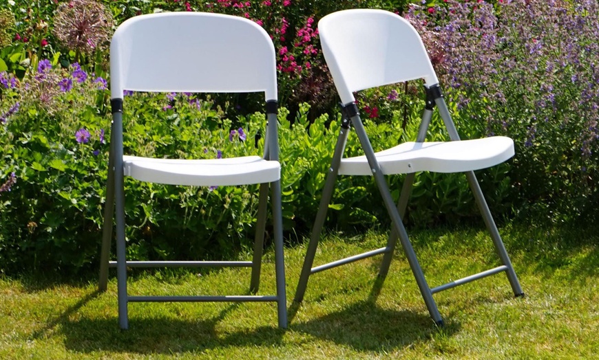 Image 1: Two, Four or Six Heavy-Duty Folding Plastic Chairs With Free Delivery