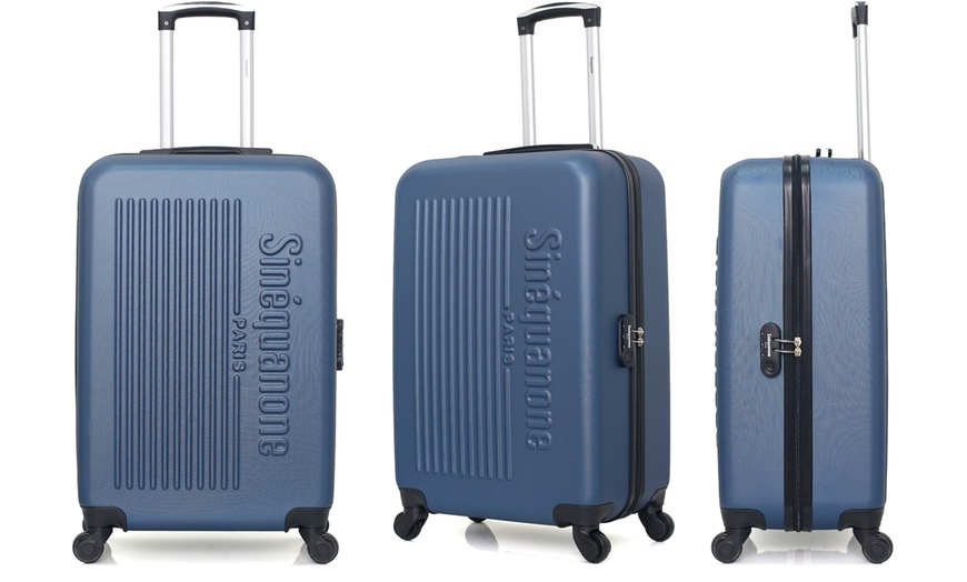 Image 40: Set of Three Suitcases