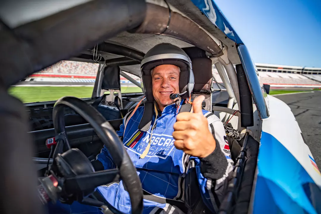 Feel the pace w/ 5-min track drive and action-packed NASCAR ride-along