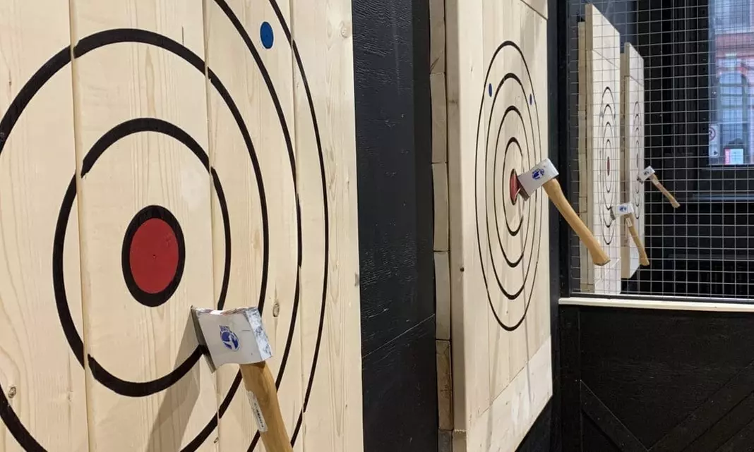 Experience thrilling axe throwing sessions at The Bad Hatchet for groups of two, three, or four people with up to 46% off - Primary Image