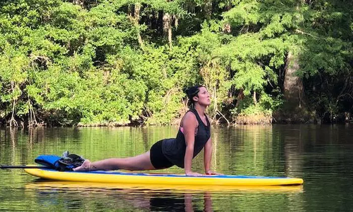 SUP Paddle Board Yoga Class or Excursion for Two or Four at Cypress SUP Yoga and Paddle Board (Up to 31% Off) - Primary Image
