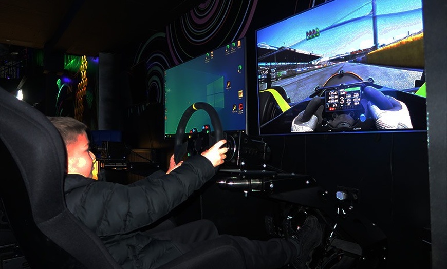 Image 3: Rev up the excitement with immersive driving simulators!
