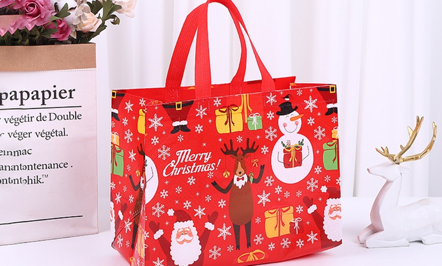 Image 2: 8 or 16 Christmas-Themed Non-Woven Bags