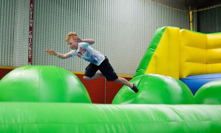 Image 2: Slide, Jump, Laugh—Unleash Your Inner Child at Inflatable World!