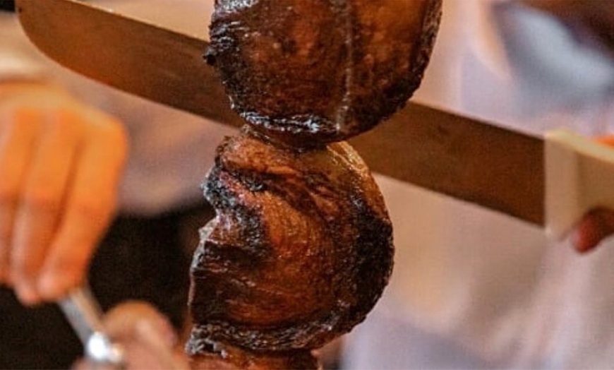 Image 8: All-You-Can-Eat Rodizio Dinner with Wine for 2 or 4 at Rio de Brazil Steakhouse Up to 28% Off