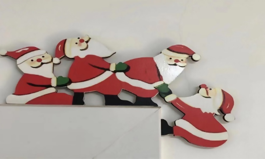 Image 2: One- or Six-Pack of Festive Wooden Door Frame Decorations