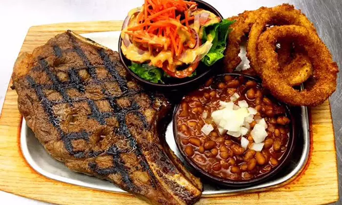 Smokehouse and Grill Fare from Carlos & Gabbys Smokehouse & Grill (Up to 40% Off).  Two Options Available.  - Primary Image