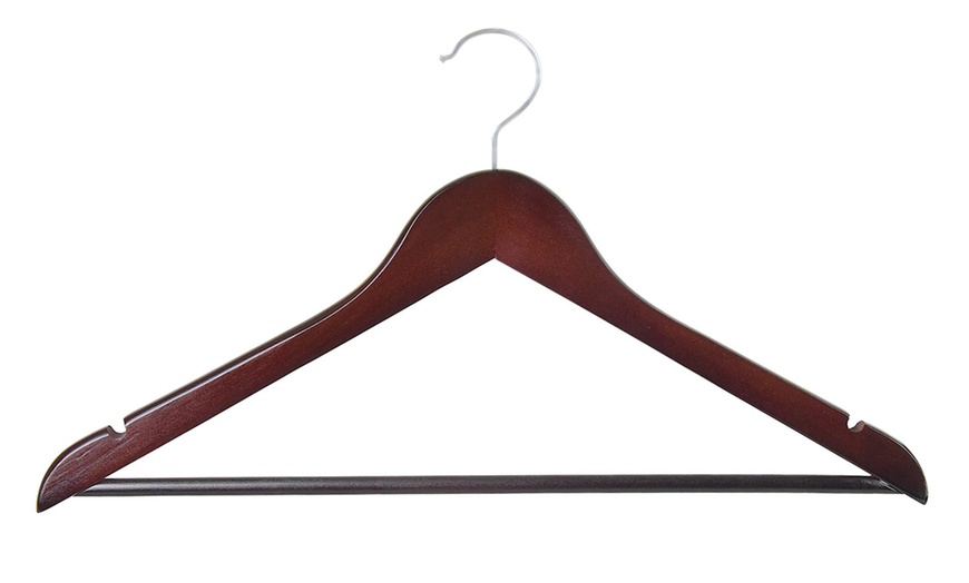 Image 8: 10 Wooden Hangers