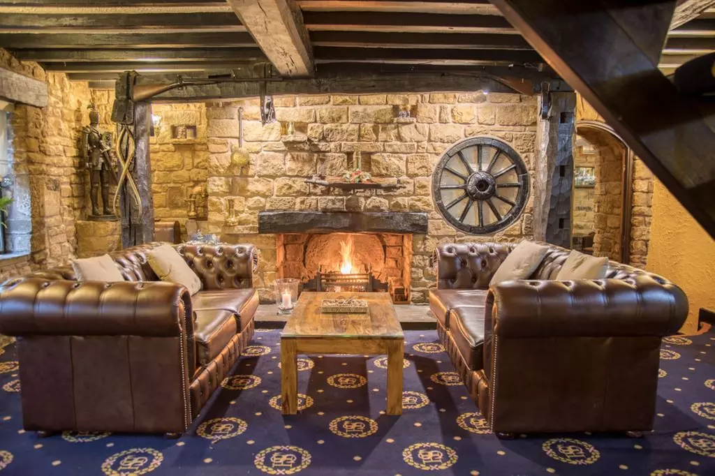 Relaxing Afternoon Tea with a Glass of Buck's Fizz in Historic Stables