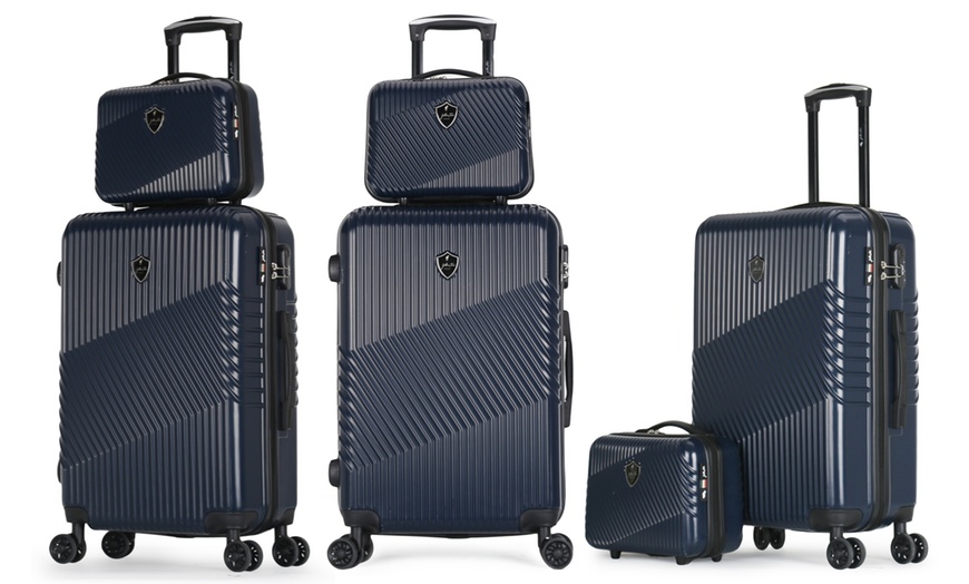 Image 27: Four-Piece Luggage Set