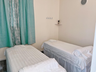 For One: 60-Minute Deep Tissue Massage with Hot Stones and Anti-Allergy Aromatherapy - W Whitman Foot spa