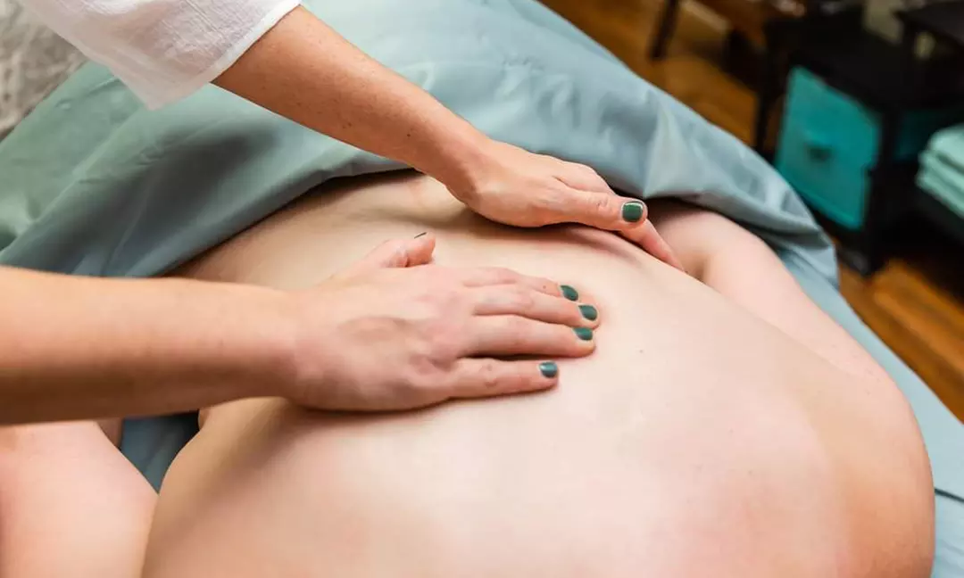 Discover Bliss at Sacred Space Wellness: Custom or Deep Tissue Massage Options (Up To 31% Off) - Second Medium