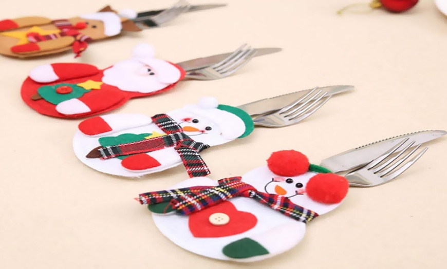 Image 4: Upto 12 Packs of Snowman Xmas Cutlery Holders