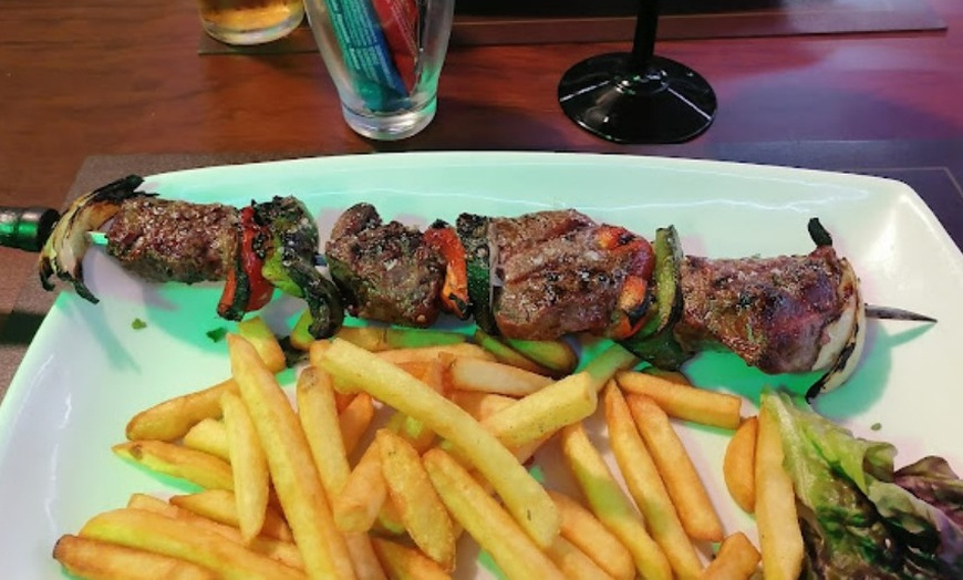 Image 2: ♨ Menú de carne o pescado a la parrilla en Alaska steak house