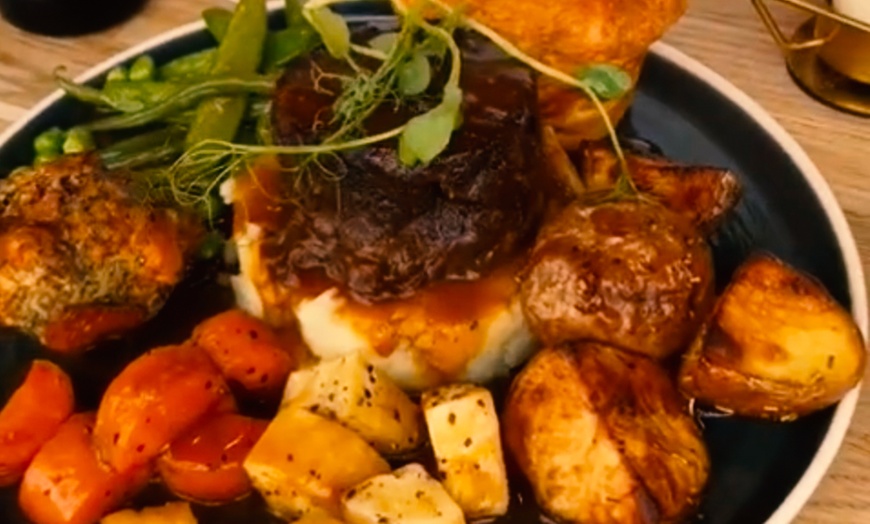 Image 1: One or Two-Course Sunday Roast for Two with Optional Glass of Wine