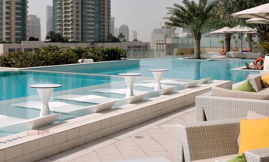 Image 2: Pool Access with Food Credit at 5* Sofitel Dubai Downtown