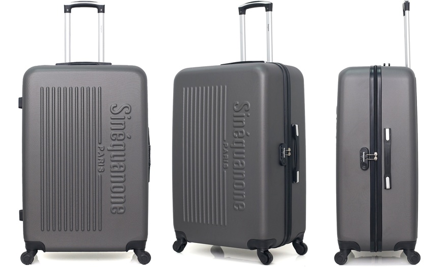 Image 17: Set of Three Suitcases