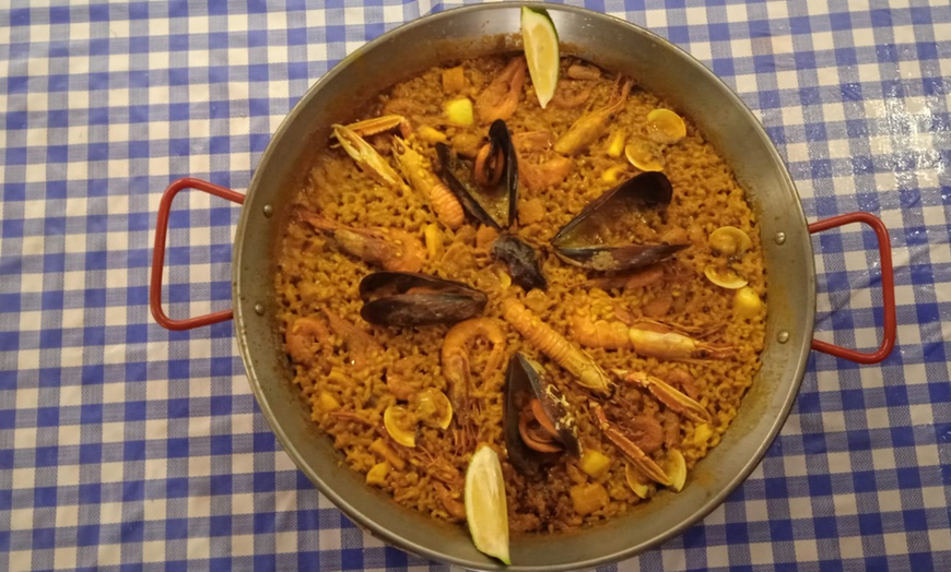 Image 1: Menú a elegir entre mar y montaña o paletilla para 2 con vino 