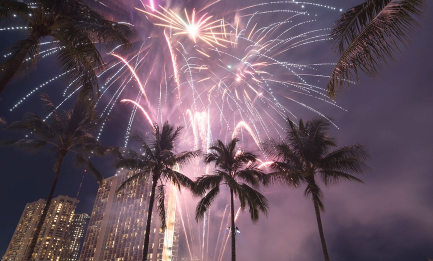 Image 1: Friday Night Fireworks Cruise for 1, 2 or 4 at Waikiki Adventure Sails! Gaze at Waikīkī’s Skyline and Save 38%! 