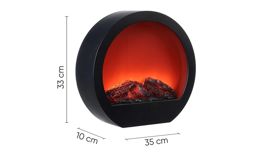 Image 6: Chimenea redonda decorativa moderna con efecto llama led