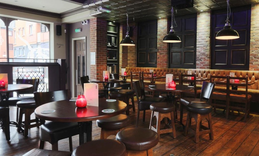 Image 2: Up to 50% Off on Restaurant speciality - Burgers at Tib Street Tavern