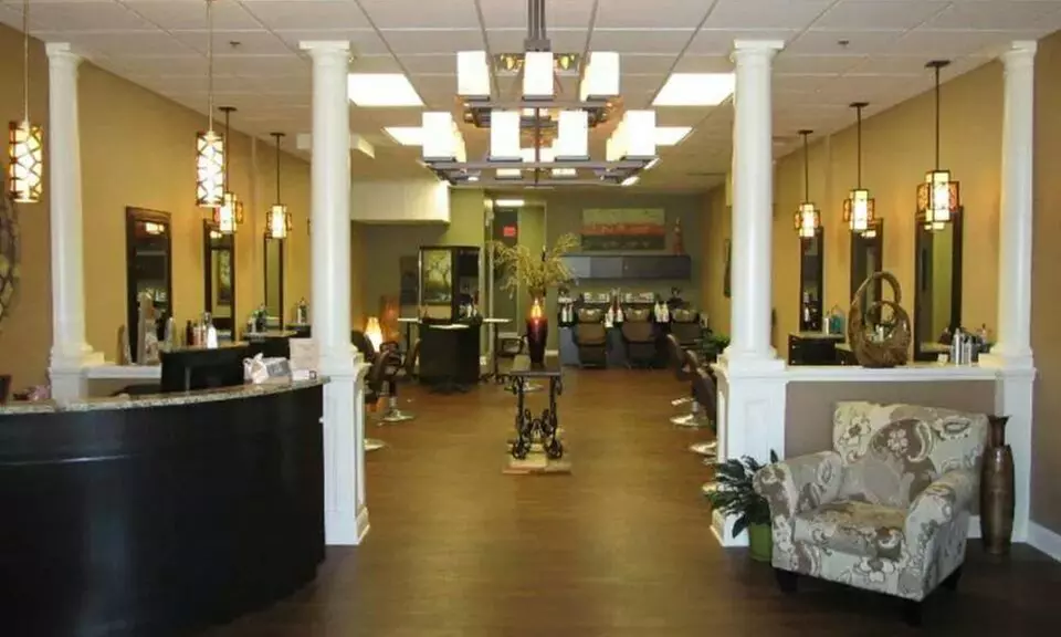Haircut with Style, Partial Highlights, or Single Process Color at Style Station Salon & Tanning (Up to 57% Off) - Primary Image