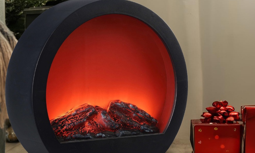 Image 5: Chimenea redonda decorativa moderna con efecto llama led