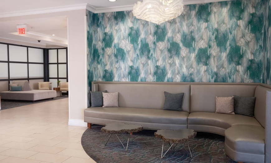 Image 3: Spacious suites, free breakfast, pool, and easy access to beaches