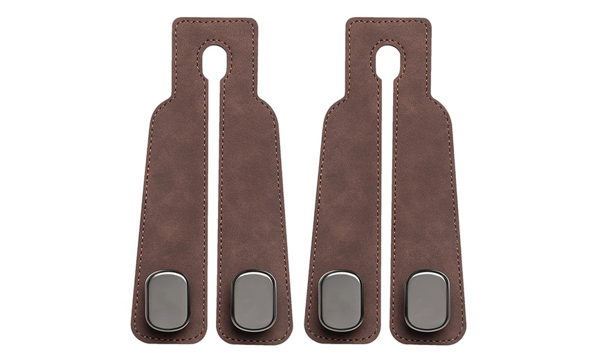 Image 2: Two or Four Pieces of Car Headrest Storage Hanging Hooks Set