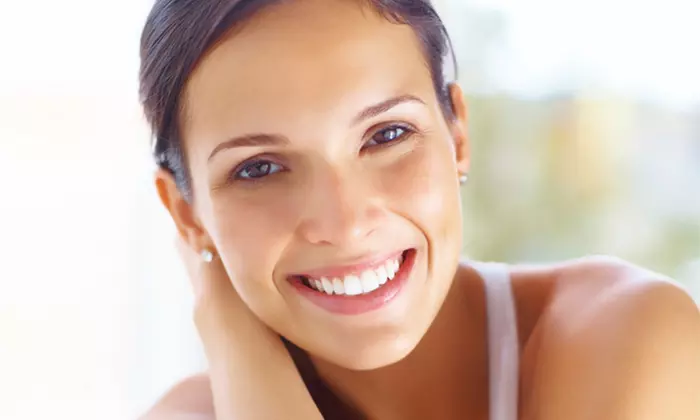 One or Two Dental Exams with Cleaning and X-rays or Exam with Whitening at Dental Expressions (Up to 68% Off) - Primary Image