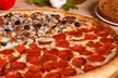 1 Large Pizza w/1-2 Toppings & 1 Side, Large Specialty Pizza Or $30 Voucher Towards Food & Drink (Up to 37% Off) - Second Medium
