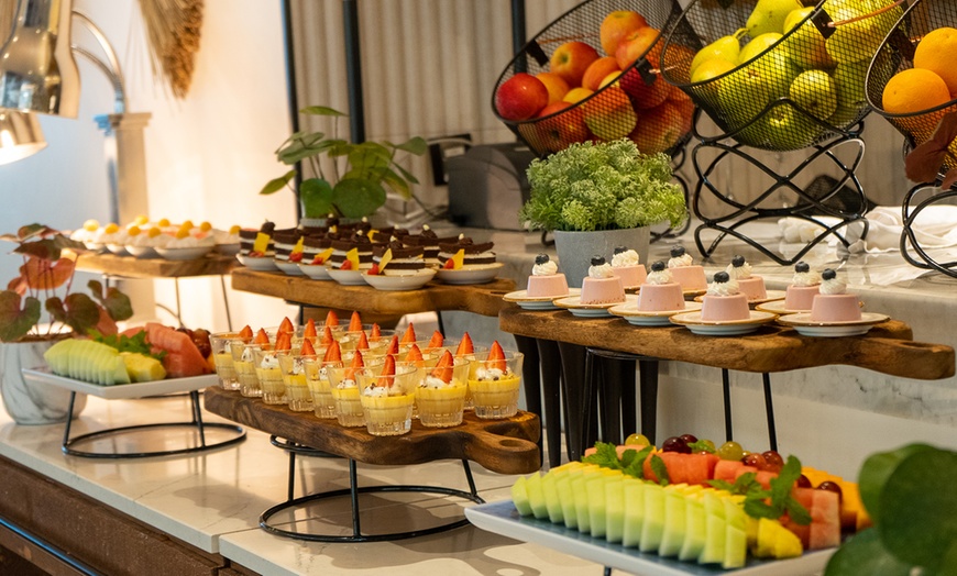 Image 6: Theme Night Buffet with Free-Flowing Tea, Coffee, and Juices!