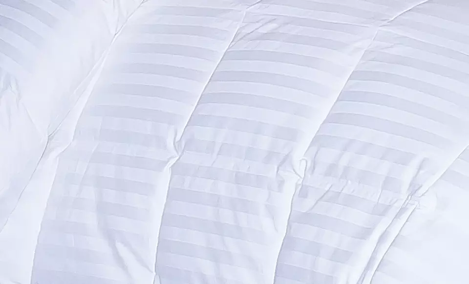 All-Season 300-Thread-Count Down-Alternative Oversize Comforter. Multiple Sizes from $34.99–$44.99. Free Returns. - Second Medium
