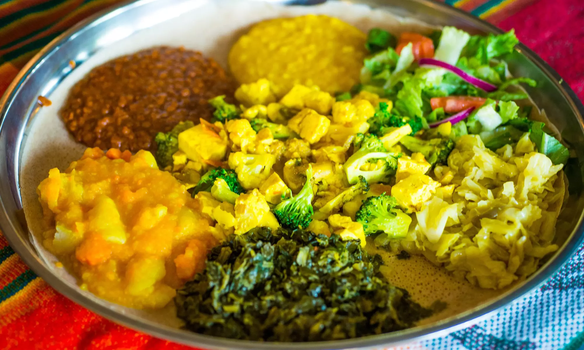 Experience Queen Sheba of Sacramento's Ethiopian dishes with Veggie or Vegan Combo Platter and $25 Gift Card, up to 20% off - Second Medium
