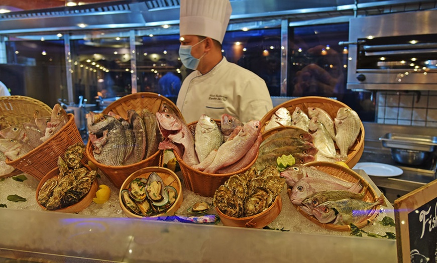 Image 8: Italian or Seafood Dinner with Beverages at 5* Swissotel Al Murooj