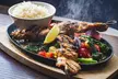 Sizzling Pub & Grill: Tuck In & Turn Up the Heat with delicious Starters & Skillets (Up to 35% Off) - Second Medium