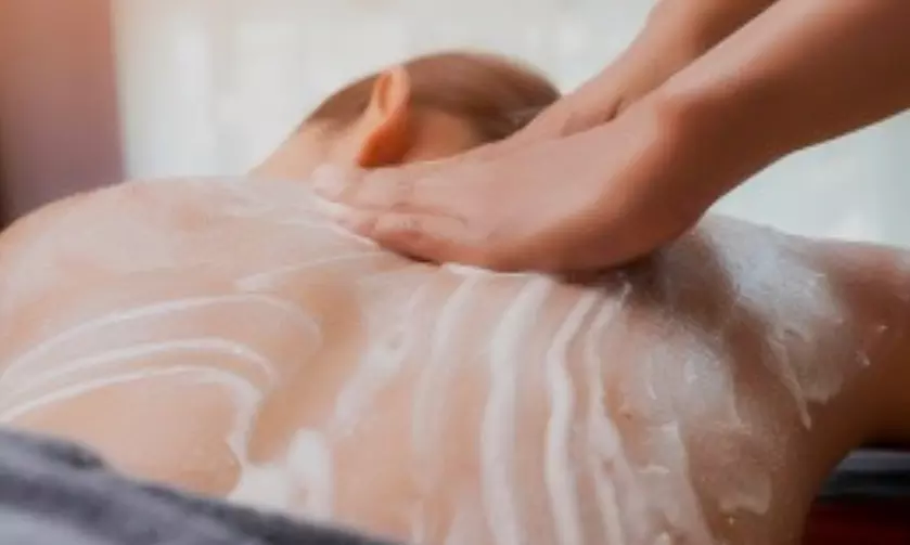 30-Minute Body Scrub w/ Optional Signature or Deluxe Hydrating Facial