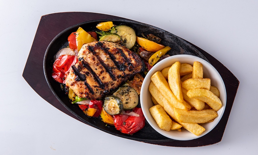 Image 12: Two Starters and Two Skillets at ⭑★ Sizzling Pub & Grill ★⭑