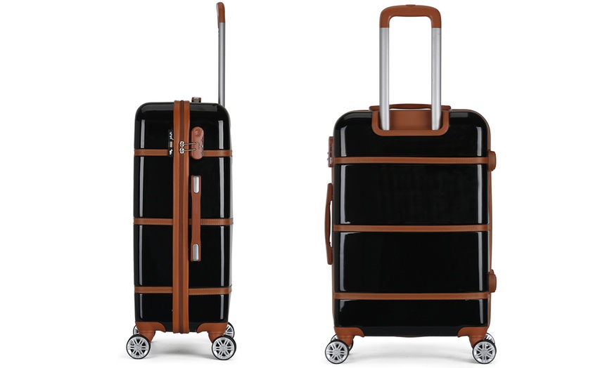 Image 4: Four Trolley Suitcases Set