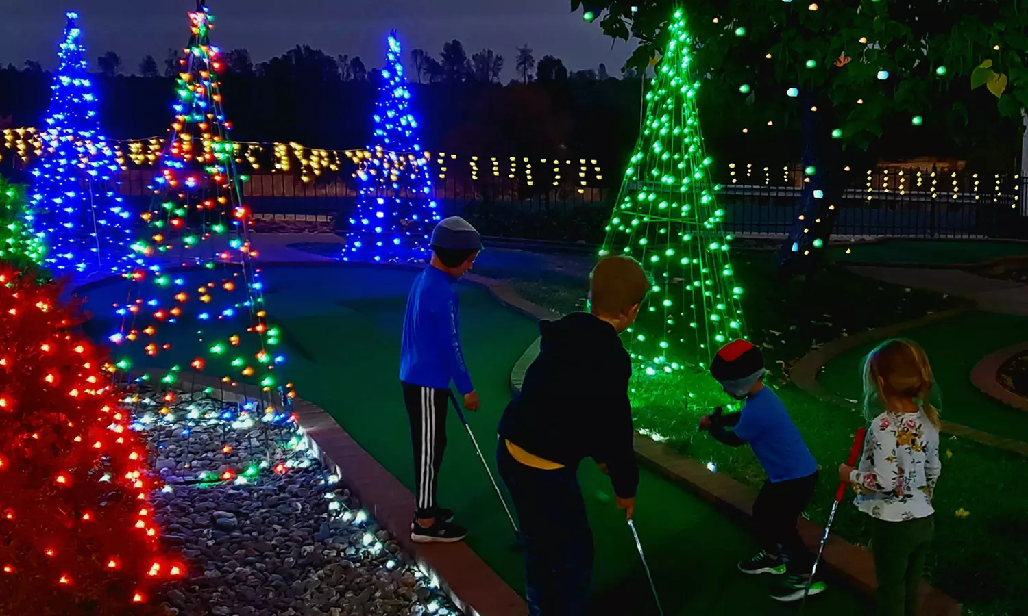 18-Hole Golf Course of Lights-Golf Round for One, Two, or Four at Oasis Fun Center (Up to 21% Off) - Primary Image